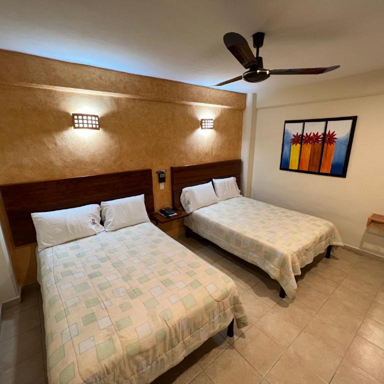 Hotel La Iguana - Habitación Doble - 2 camas dobles - 1
