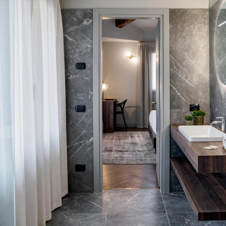 Porta Altinia Suites - Camera Deluxe - 3