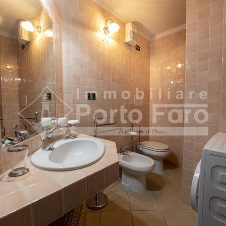 23 BAIA FARO - Trilocale mansardato con ampia terrazza vista mare - Appartamento - 12