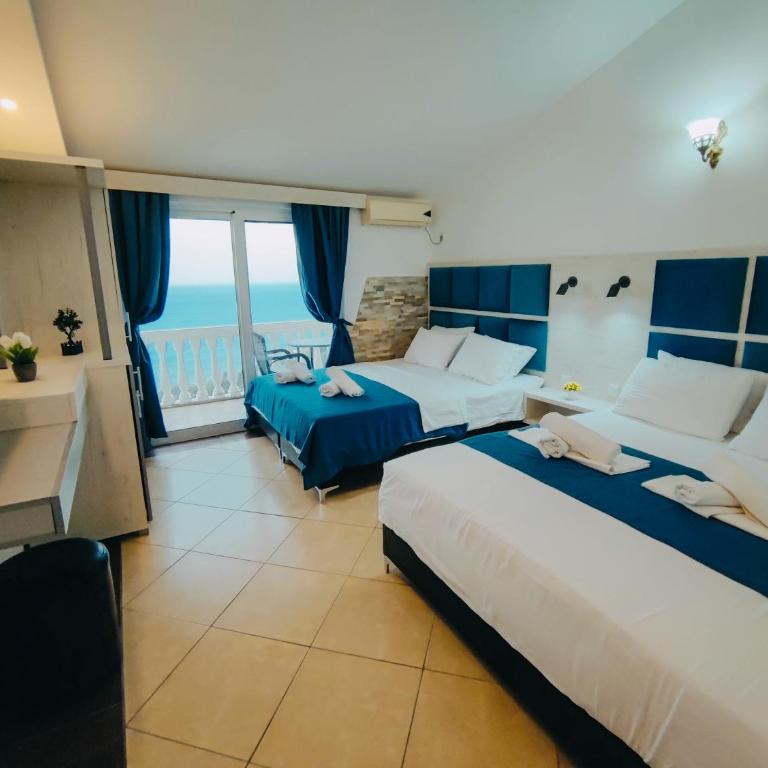 Sun Apartments - Četvorokrevetna Soba sa Balkonom i Pogledom na More - 3