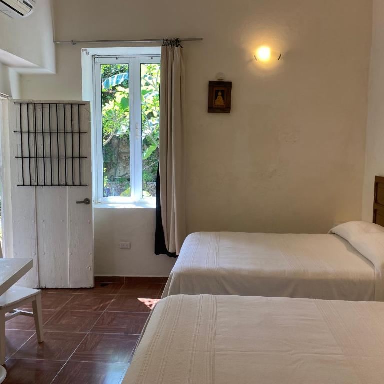 Hotel La Piazzetta - Double Room with Two Double Beds and Garden View - 8