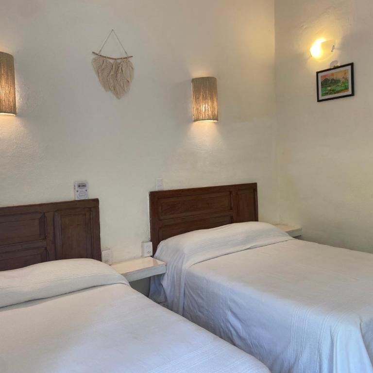 Hotel La Piazzetta - Double Room with Two Double Beds and Garden View - 1
