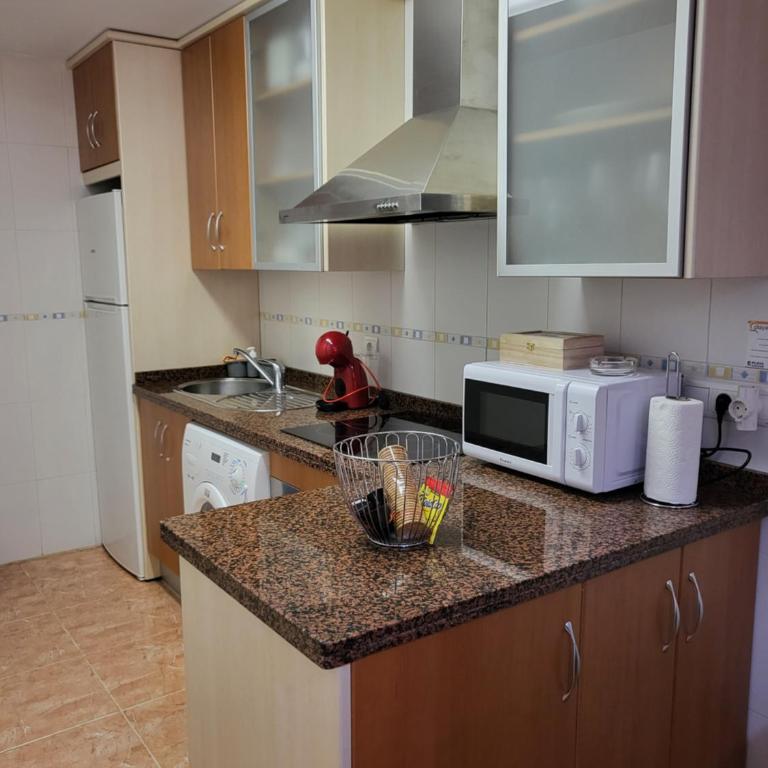 ¡Bajo precioso con salida directa a la piscina comunitaria en Paraíso de Vera! - Apartamento de 2 dormitorios - 45