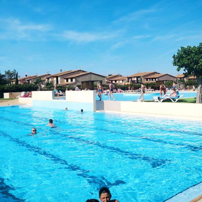 Maison avec piscine chauffée de Pâques à la toussaint accès animation & parc aquatique de juin à fin septembre - Haus mit 2 Schlafzimmern - 4