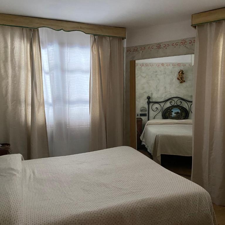 Locanda le Monache - Camera Tripla Comfort - 7