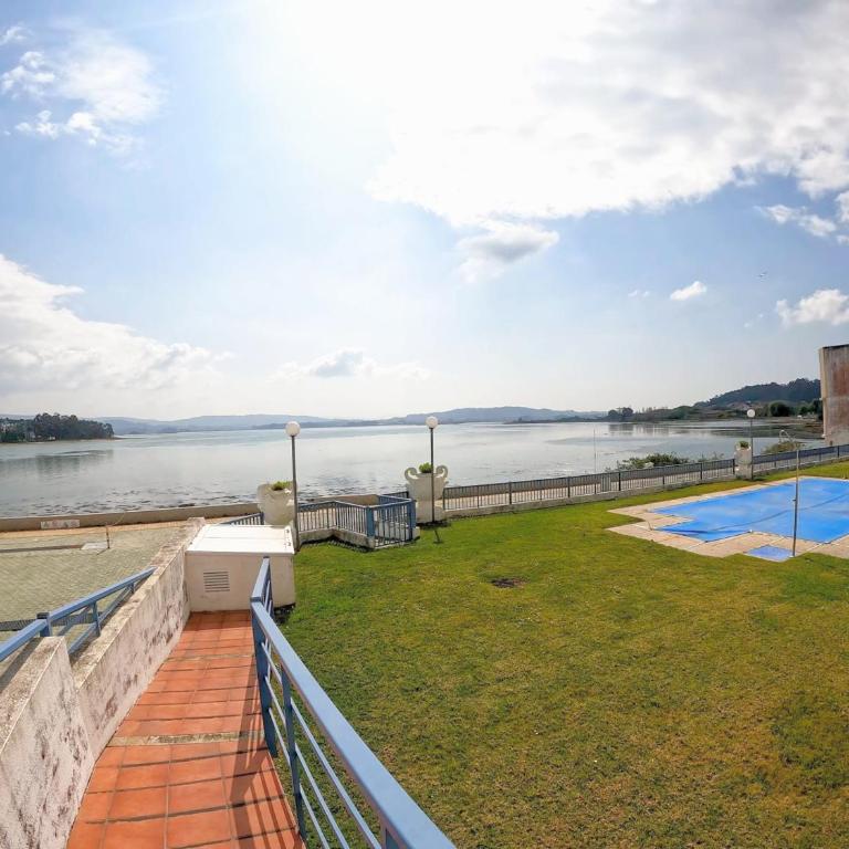 Precioso apartamento con piscina y jardín frente a la Toja - Apartamento de 1 dormitorio - 10