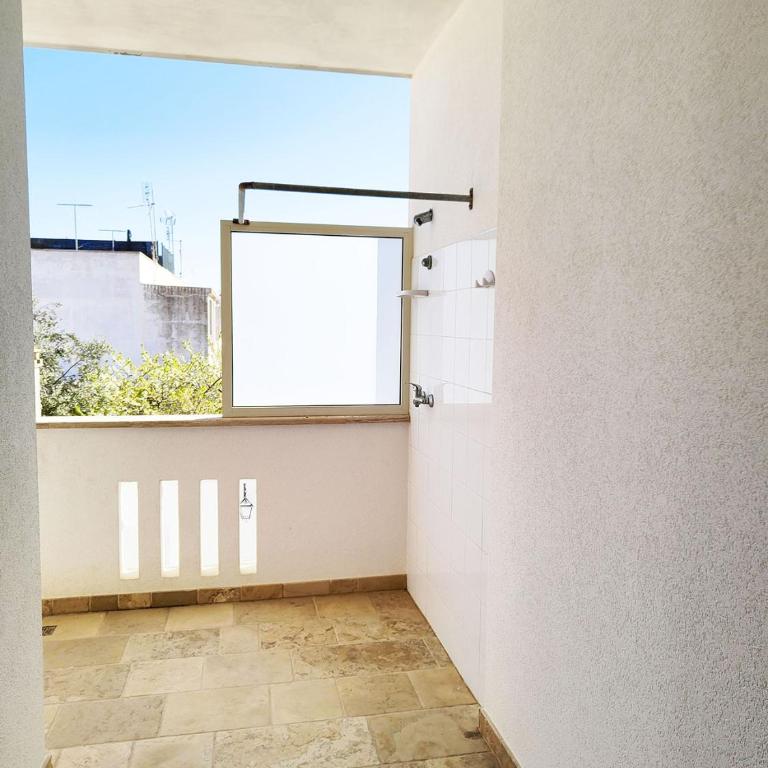 Quadrilocale Dafne in centro città in Salento - Appartamento con 3 Camere da Letto - 12