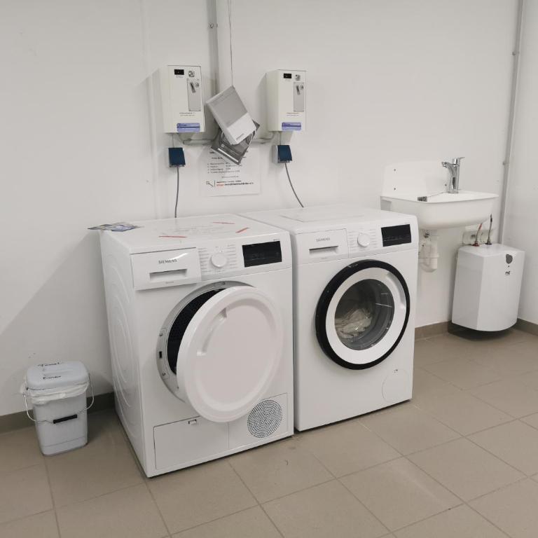 Ferienwohnung Bergsonne mit Sonnenbalkon und Tiefgaragen Parkplatz - Apartment mit 1 Schlafzimmer - 25