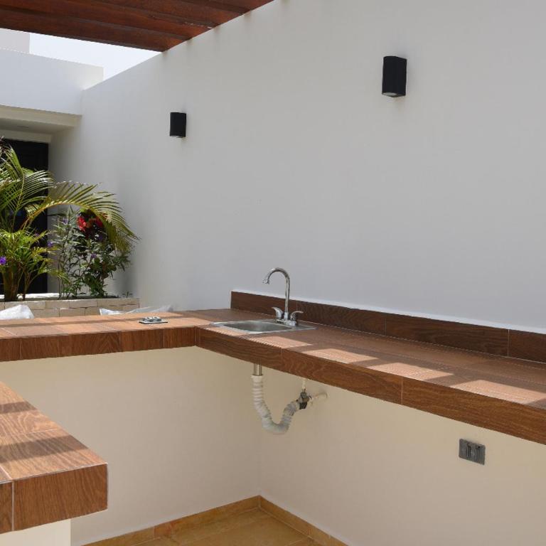 Suites calle 38 - Estudio con cama extragrande - 25