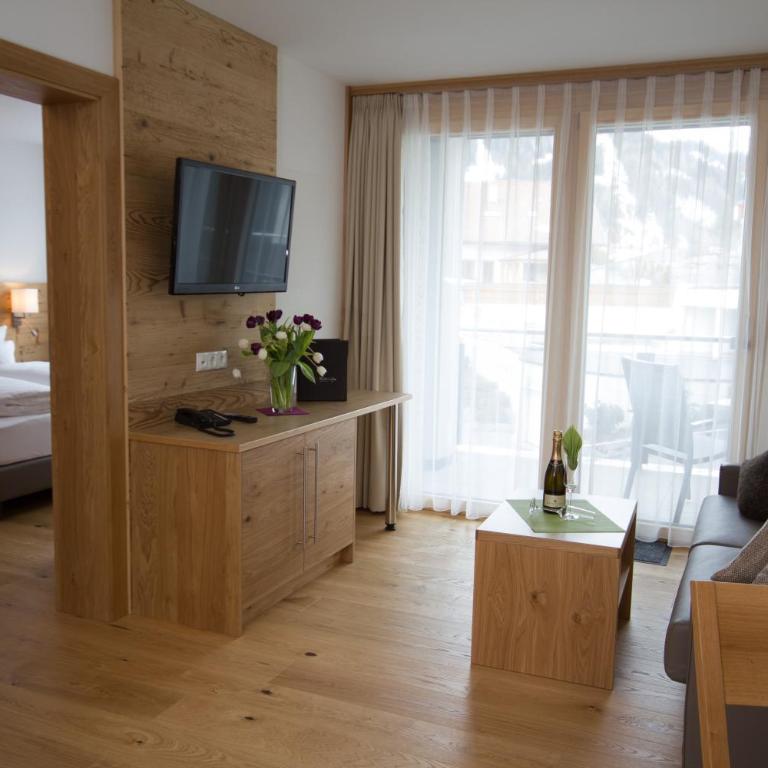 Berglife Appartements - Apartment mit 3 Schlafzimmern und einem Balkon oder einer Terrasse - 4