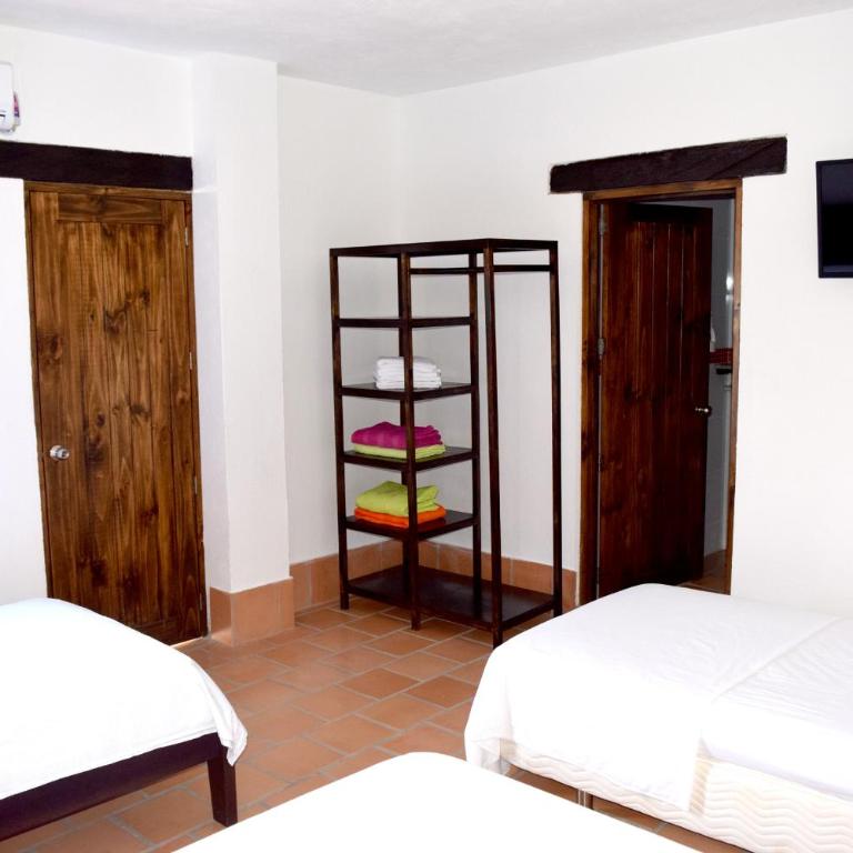 Chrisban Hotel Boutique - Habitación Cuádruple Deluxe - 5