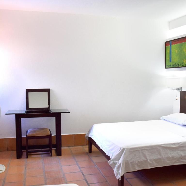 Chrisban Hotel Boutique - Habitación Triple Clásica - 5