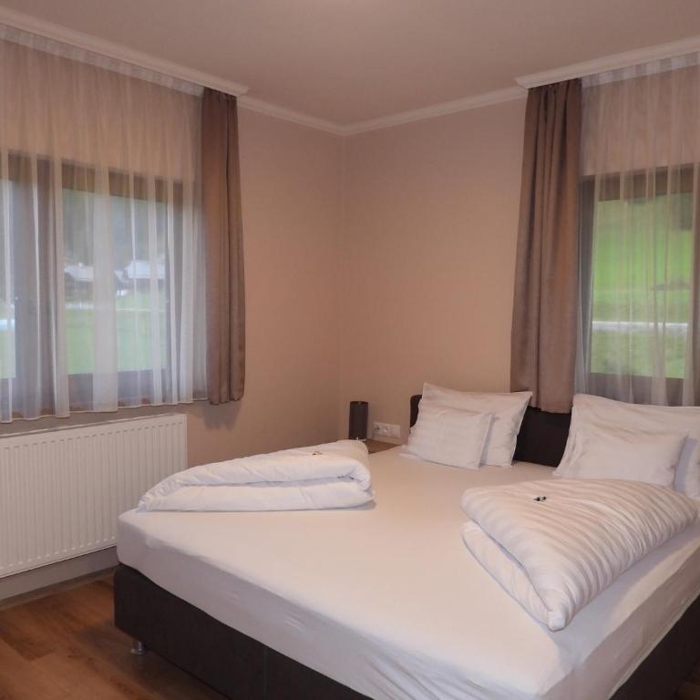 Nockalm Cottage - Apartment mit 1 Schlafzimmer, Balkon und Bergblick - 9