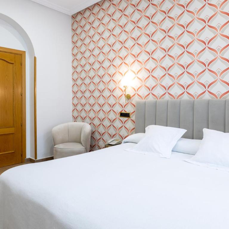 Hostal Oriente - Habitación Doble con vistas a la ciudad - 1 o 2 camas - 4