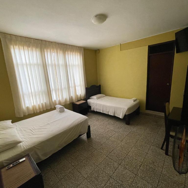 Hotel Calmelia - Twin Room with View - 6