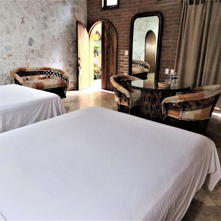 Hotel Casa de Lirio Diamante - Habitación con 2 camas grandes - 4