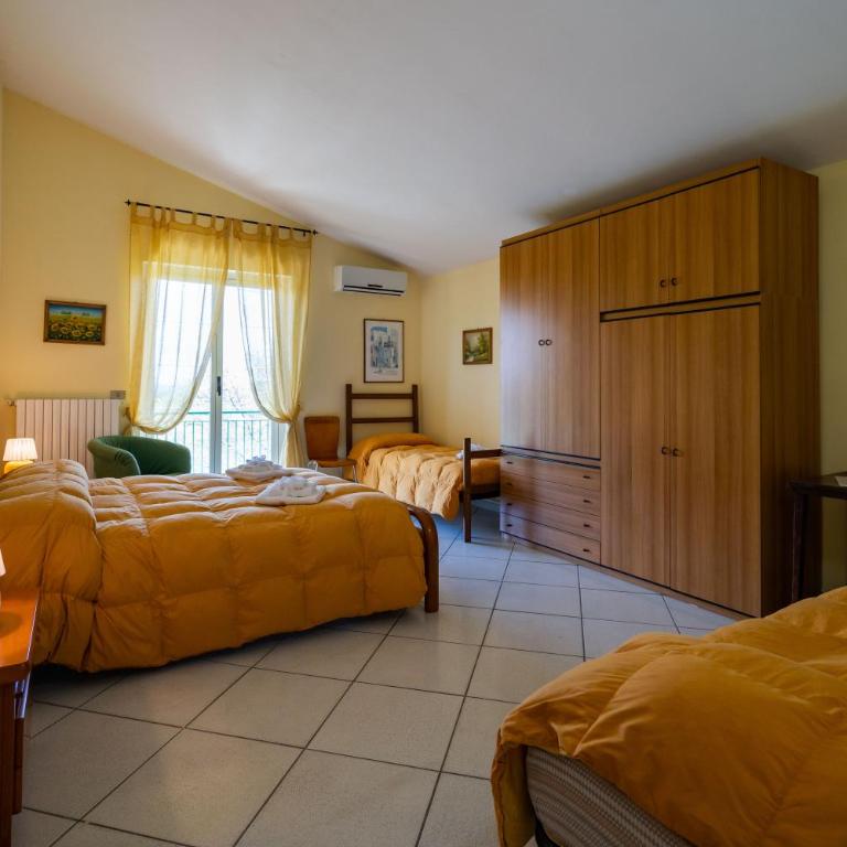 Villa Brunella - Camera Quadrupla Deluxe - 1