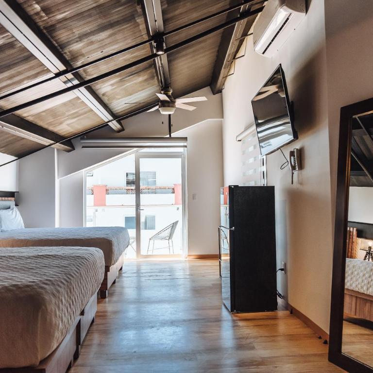 Loft Hotel Malecón Vallarta - Suite Deluxe con cama extragrande - 2