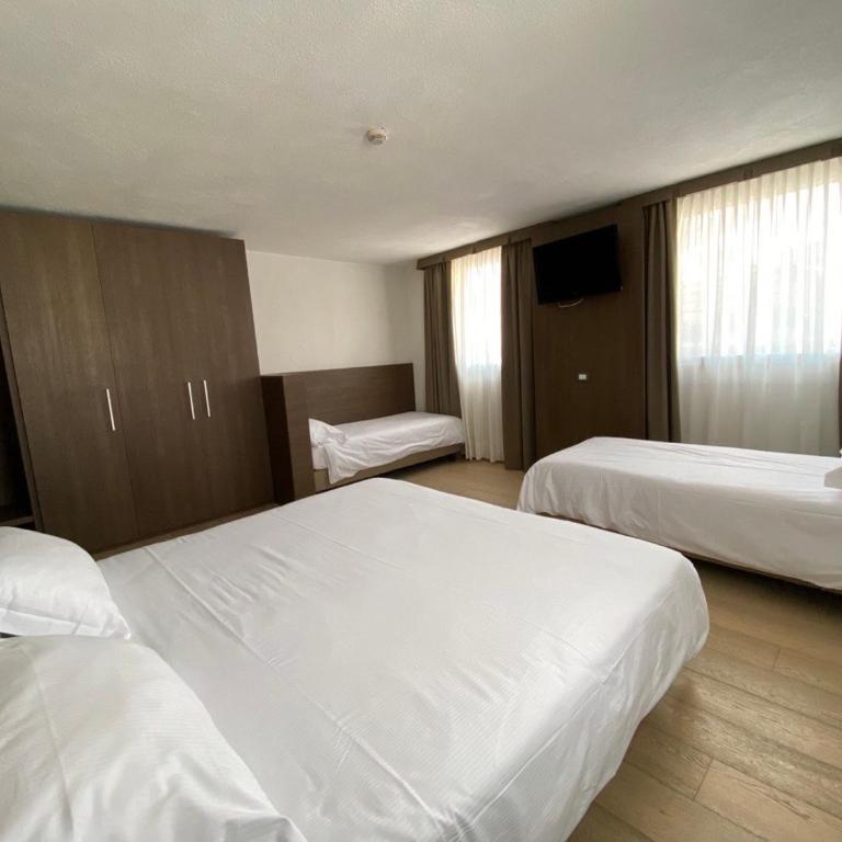Grand Hotel Miramonti - Camera Quadrupla Deluxe - 1