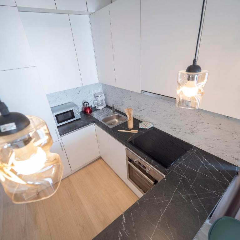 Modern Two Bedroom Apartment with Partial Sea View, Pool and Parking - Two-Bedroom Apartment - 26