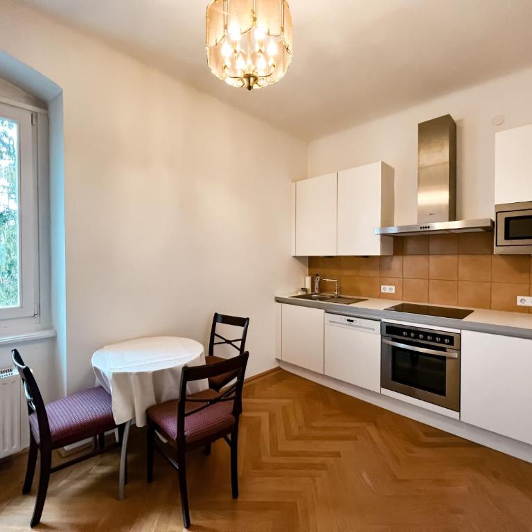 Palais Kneissl - Suite mit Gartenblick - 10