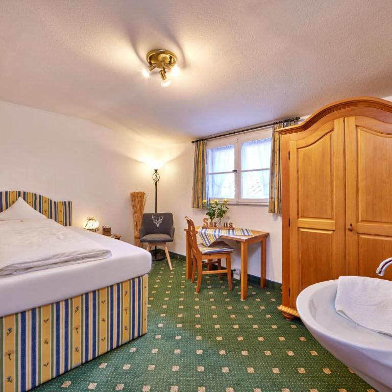 Gästehaus Angela - Einzelzimmer mit Gemeinschaftsdusche und -WC - 1