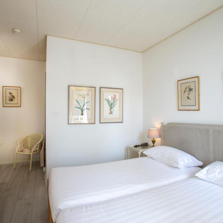 Piccolo Hotel - Camera Doppia con Letti Singoli con Balcone - 1