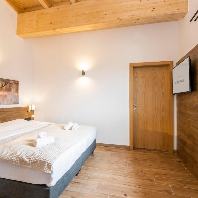 AlpenParks Hotel & Apartment Alpendorf - Superior Apartment mit 2 Schlafzimmern - 13