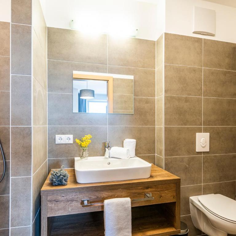 AlpenParks Hotel & Apartment Alpendorf - Apartment mit 3 Schlafzimmern - obere Etage - 3