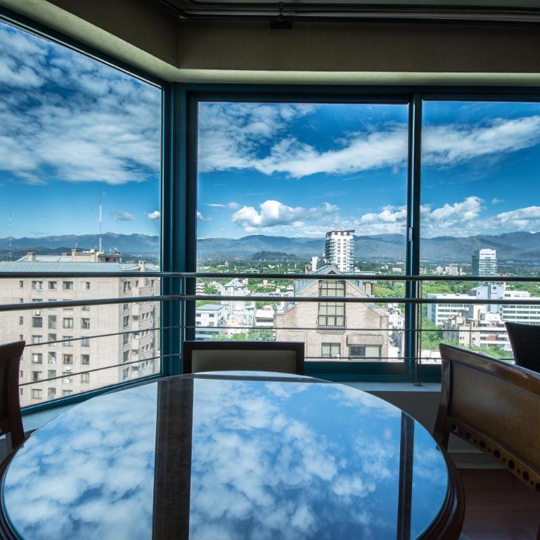 Millennium Inn Mendoza - Apartamento con vistas a las montañas - 1