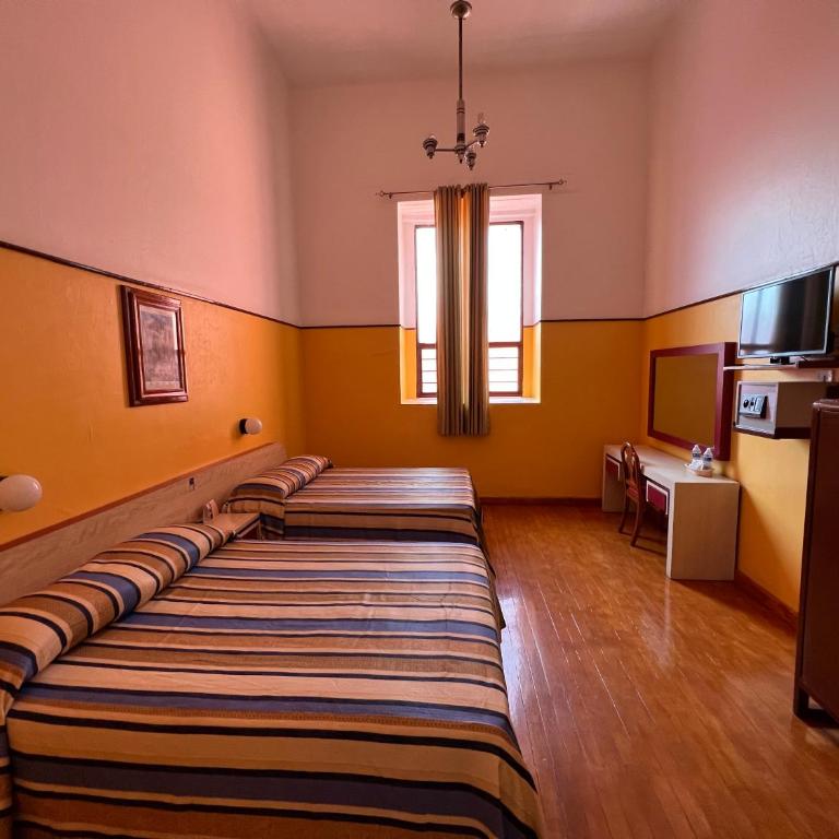 Hotel Isabel - Habitación Doble - 2 camas dobles - 6
