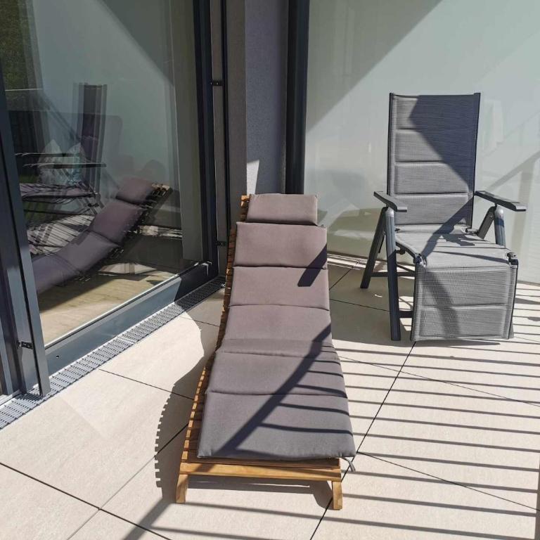 Ferienwohnung Bergsonne mit Sonnenbalkon und Tiefgaragen Parkplatz - Apartment mit 1 Schlafzimmer - 10