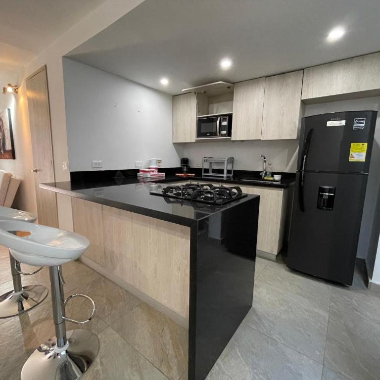 Apto Moderno, Ubicacion Perfecta, a media calle del Malecon y Embalse, a 8 min de la Piedra del Peñol - Apartamento de 2 dormitorios - 3