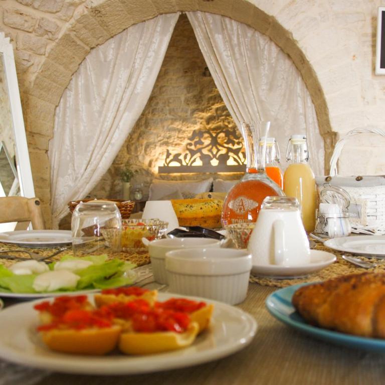 EnjoyTrulli - Unesco Site - Suite Deluxe con Vasca Idromassaggio - 1