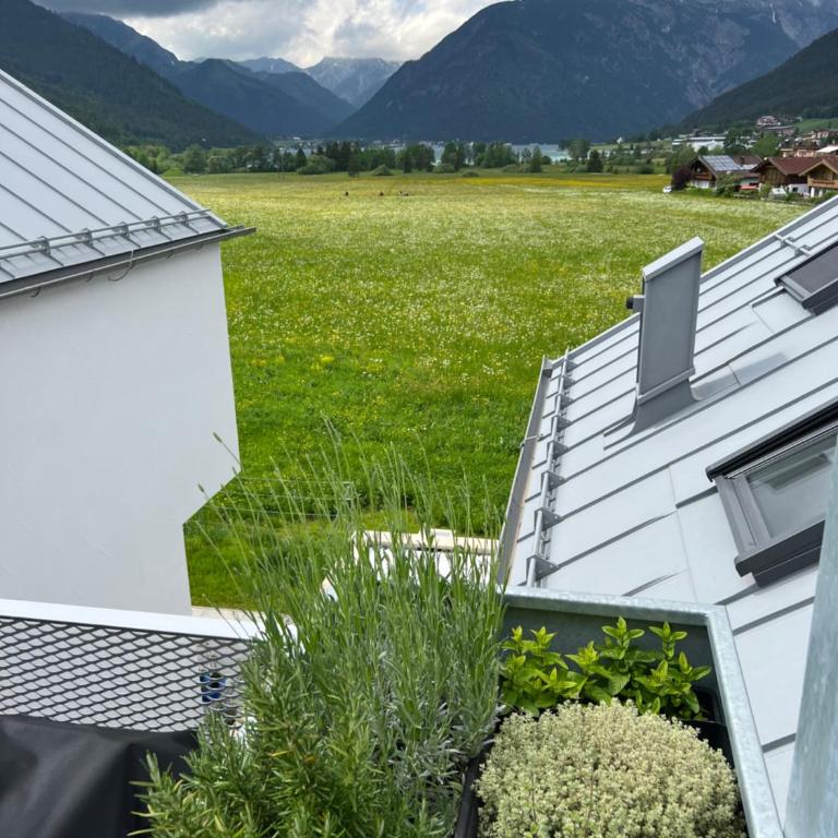 Modern Alpine Penthouse with Lake View - Ferienhaus - 20