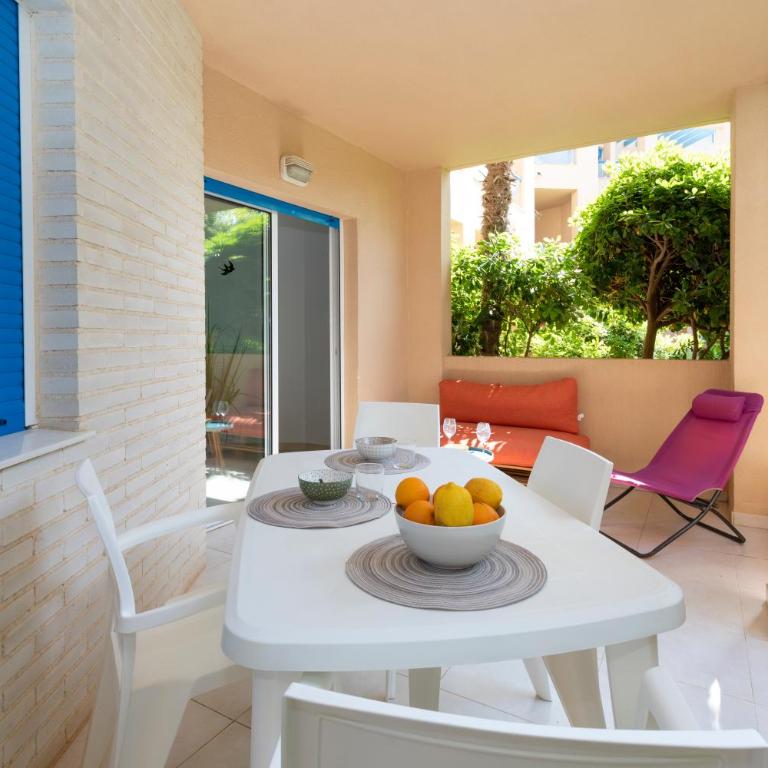 Las Dunas, bajo, 2 dormitorios, 25m del mar, by Bookindenia - Apartamento de 2 dormitorios - 6