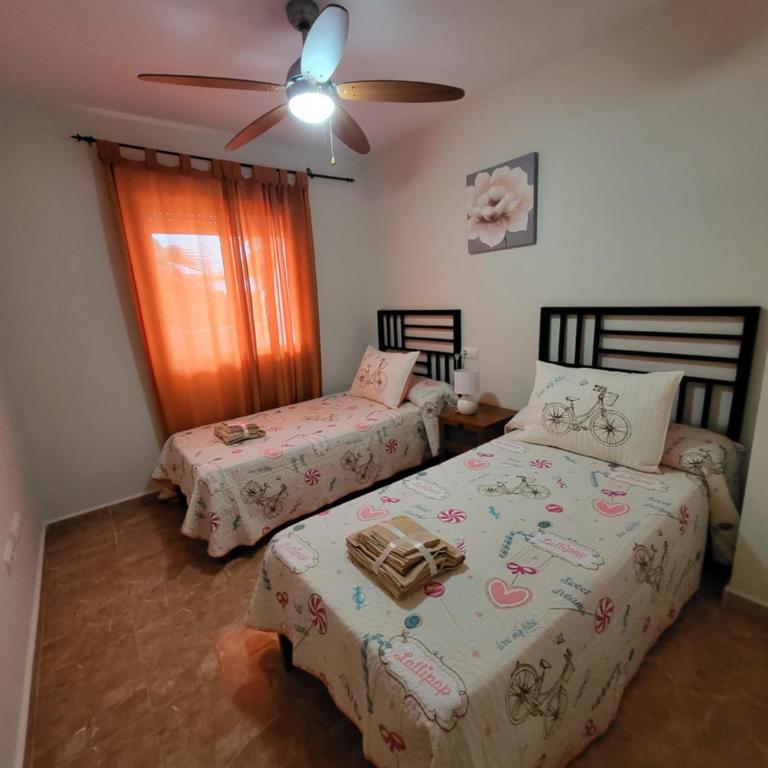 ¡Bajo extraordinario con vistas a la piscina y terraza! - Apartamento de 2 dormitorios - 24