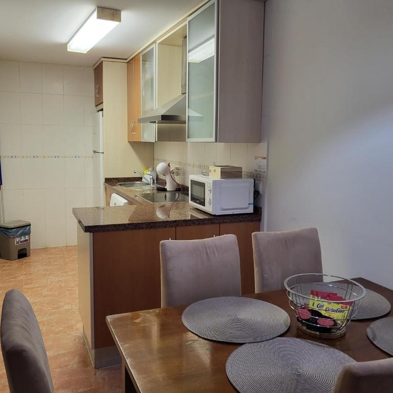 ¡Bajo con terraza y patio con vistas a la piscina comunitaria! - Apartamento de 2 dormitorios - 23