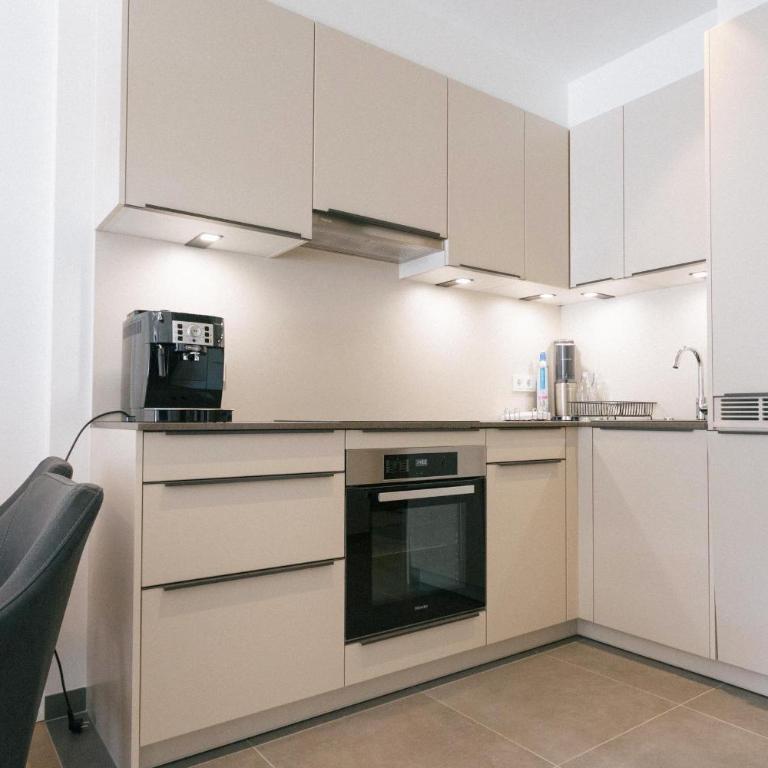 Forellenhof Appartements & Grossmutters Bungalow - Apartment mit Terrasse - 36