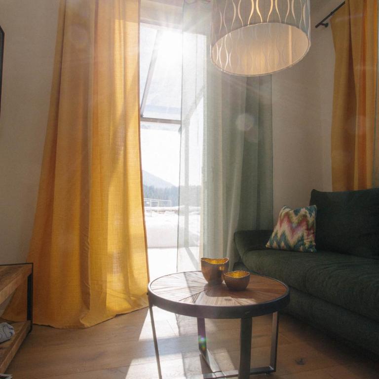 Forellenhof Appartements & Grossmutters Bungalow - Apartment mit Terrasse - 52