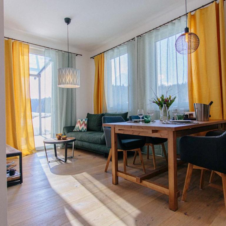 Forellenhof Appartements & Grossmutters Bungalow - Apartment mit Terrasse - 51