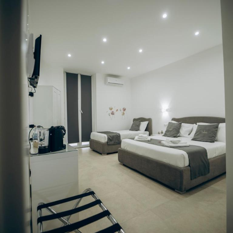 Dimora Fantasia Charme B&B - Camera Tripla con Balcone - 1