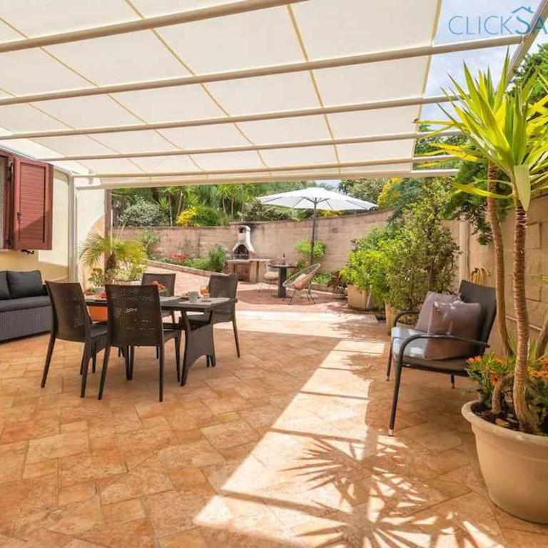 Alghero Villa Maestrale con veranda coperta giardino 4 camere 3 bagni - Casa Vacanze con 4 Camere da Letto - 5
