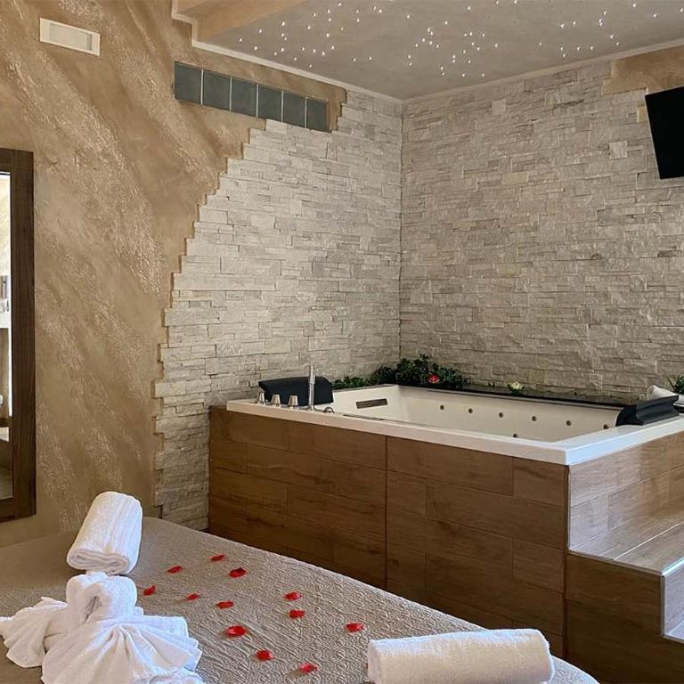 BlueBay Residence Resort - Suite Deluxe con Vasca Idromassaggio - 1