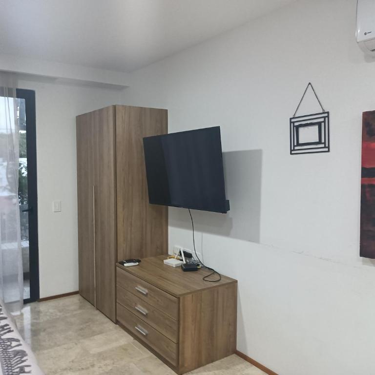 Suites calle 38 - Estudio con cama extragrande y sofá cama - 14