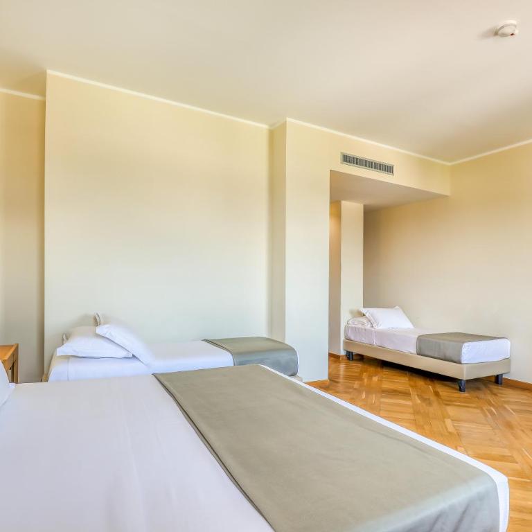 Hotel PentHouse - Camera Quadrupla Comfort - 8