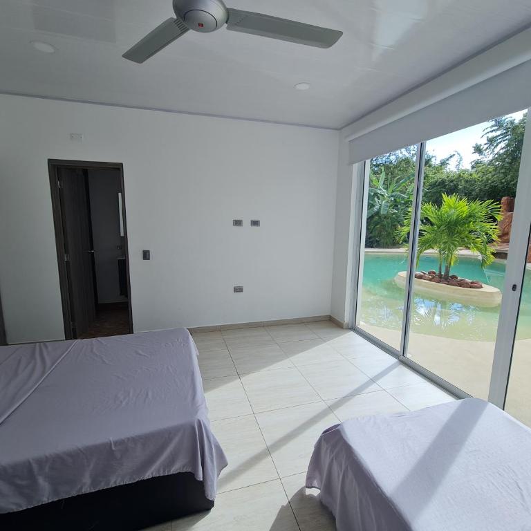 Quinta SHADDAI MELGAR - Habitación Cuádruple Confort - 1