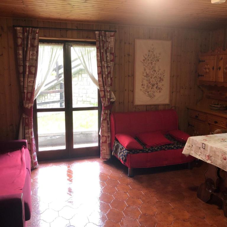 AMPIO MONOLOCALE IN CENTRO CHAMPOLUC - Monolocale con Vista Giardino - 6