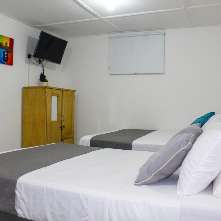 Hotel Poblado Suite - Habitación Cuádruple Estándar - 13