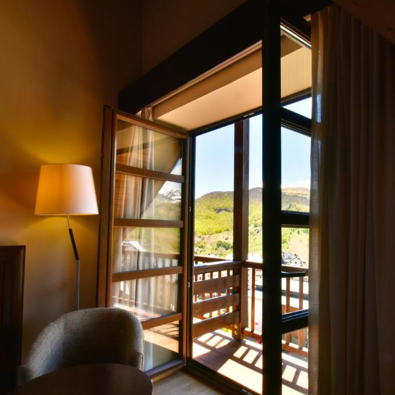 SNÖ Aragon Hills - Dreibettzimmer mit Bergblick - 4